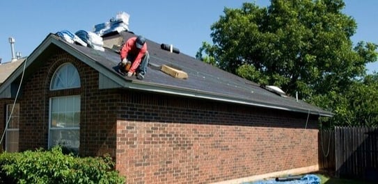 FEMA image of roofing replacement worker on home roof-1-1