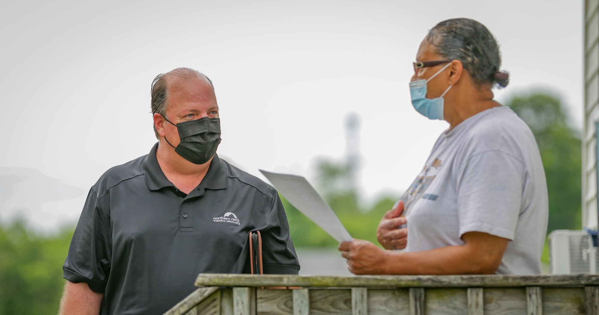 Marty field adjuster for NNINS speaking with homeowner about claim