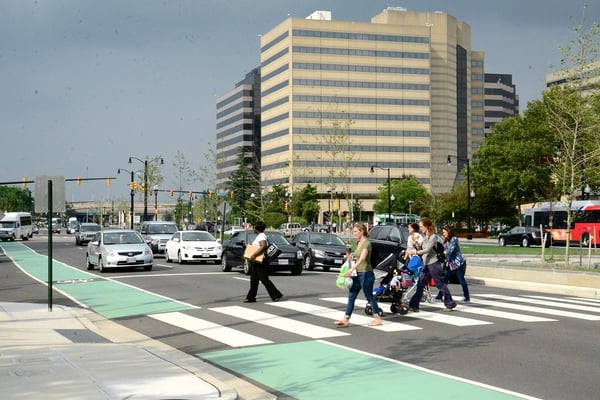 group of pedestrians walking across intersection credit: M.V. Jantzen