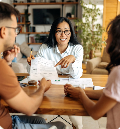 young professional agent explaining insurance policy to couple