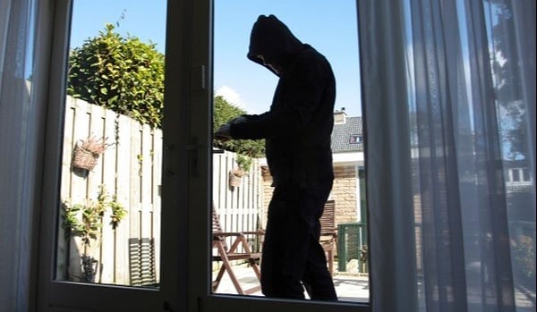 theft breaking into home through back door
